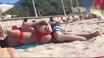 Horny Young couple fucking NON-NUDE on The Public Beach among others while all families are around them on the beach